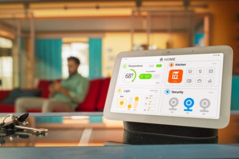 Creative Smart Home Device with Light Theme Infographics Shown on Display and Icons With Functions. Person using Smartphone to Control His stylish House. IOT Connected Wireless Intelligent System